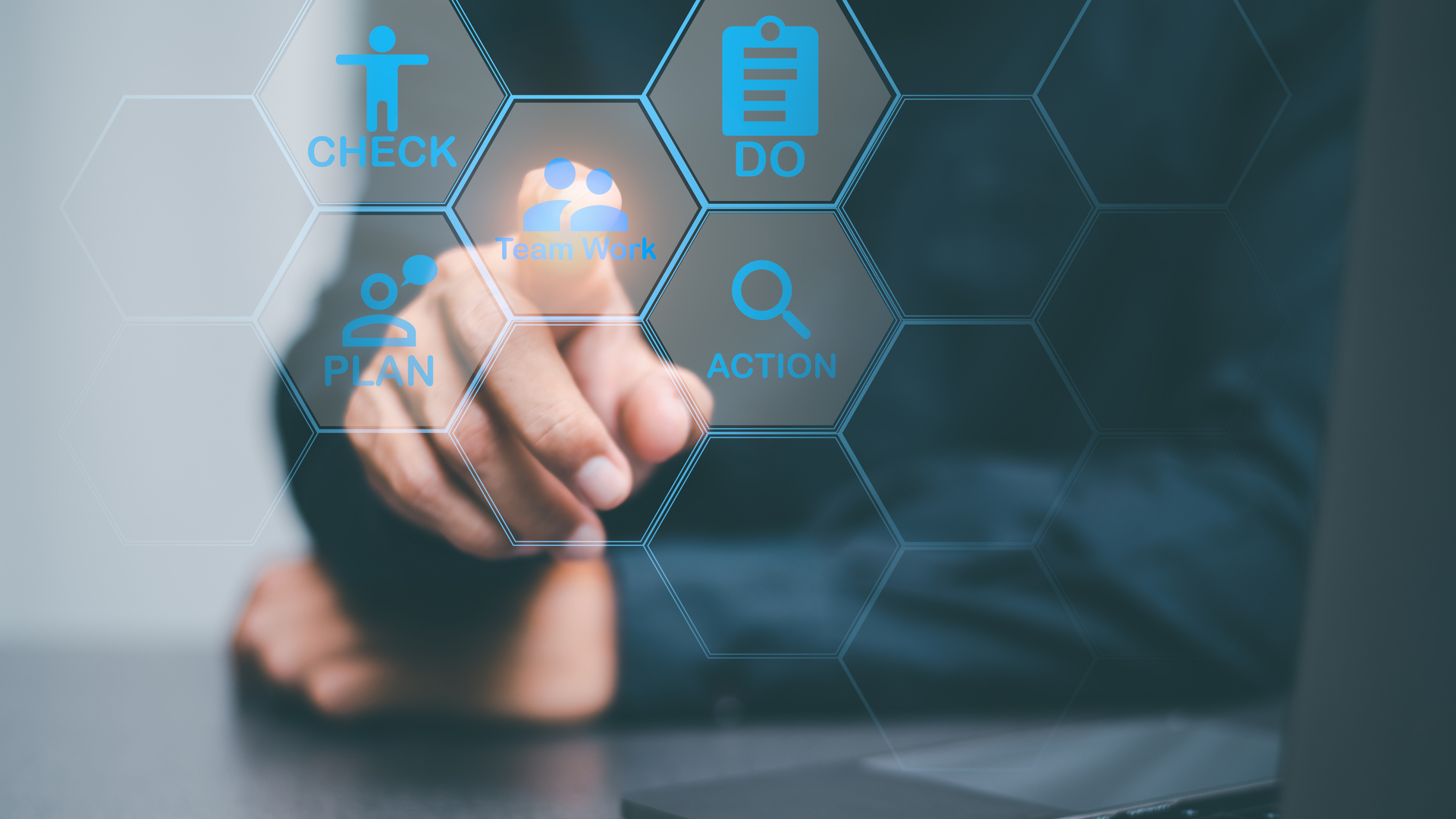 businessman with leadership pointing to icons representing teamw