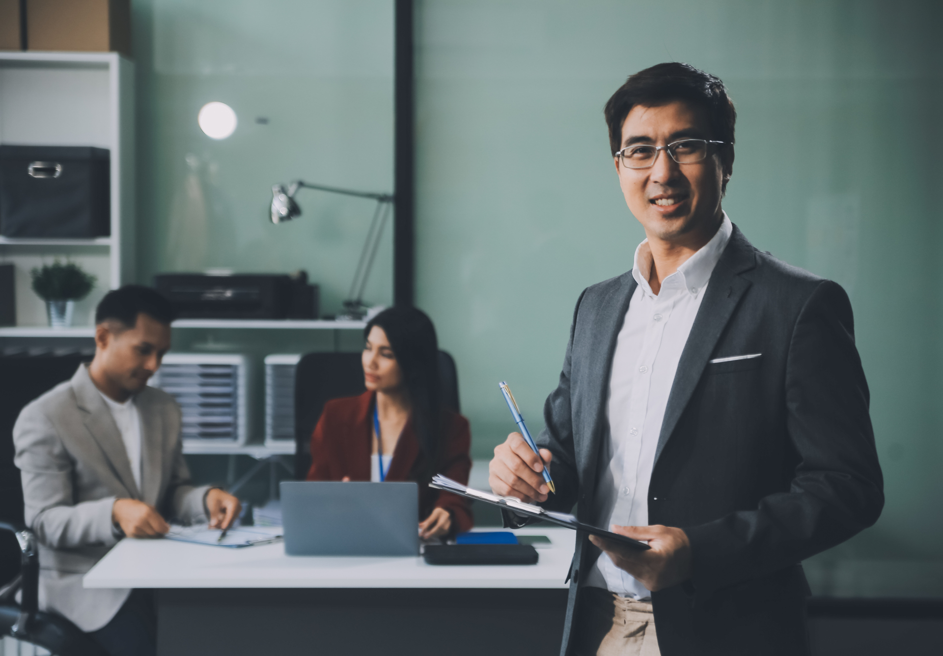 group of colleagues engaging in a discussion during a business m